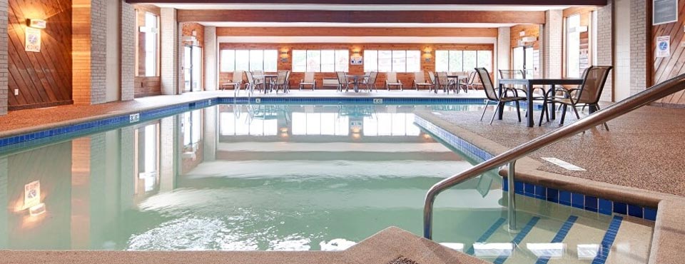 View of the Indoor Pool with plenty of seating at the Best Western Ambassador Inn and Suites in Wisconsin Dells