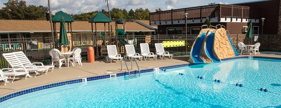 View of the Outdoor Pool with Water Slide at the Black Hawk Motel in Wisconsin Dells