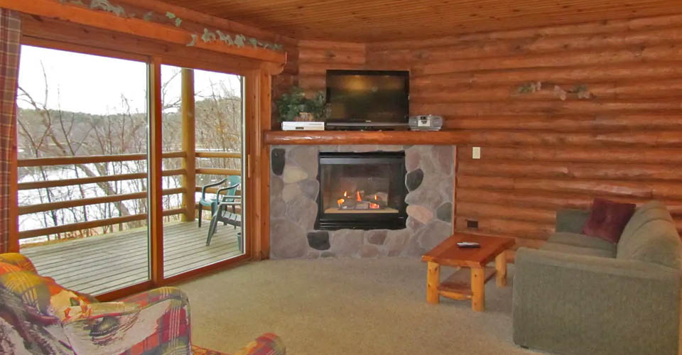 Cabin with Fireplace in Living Room at the Cedar Lodge Wisconsin Dells 960