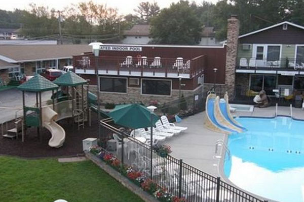 View of Heated Outdoor Pool and Water Slides at Black Hawk Motel in Wisconsin Dells